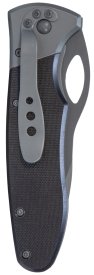 Back of grey pocket knife with textured black material and pocket clip